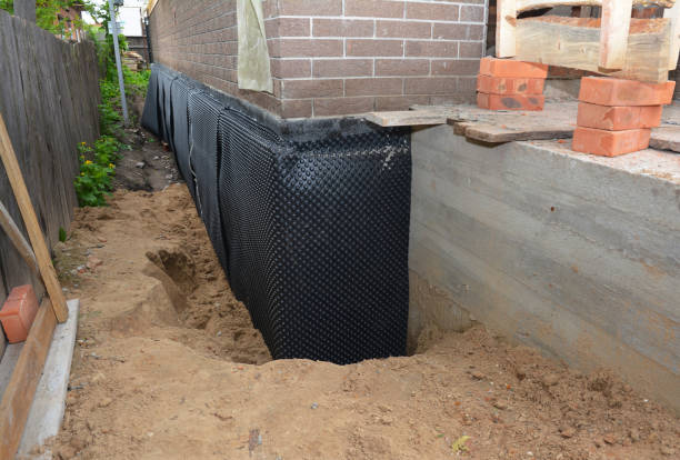 Happy homeowners after waterproofing job in Brandy Station
